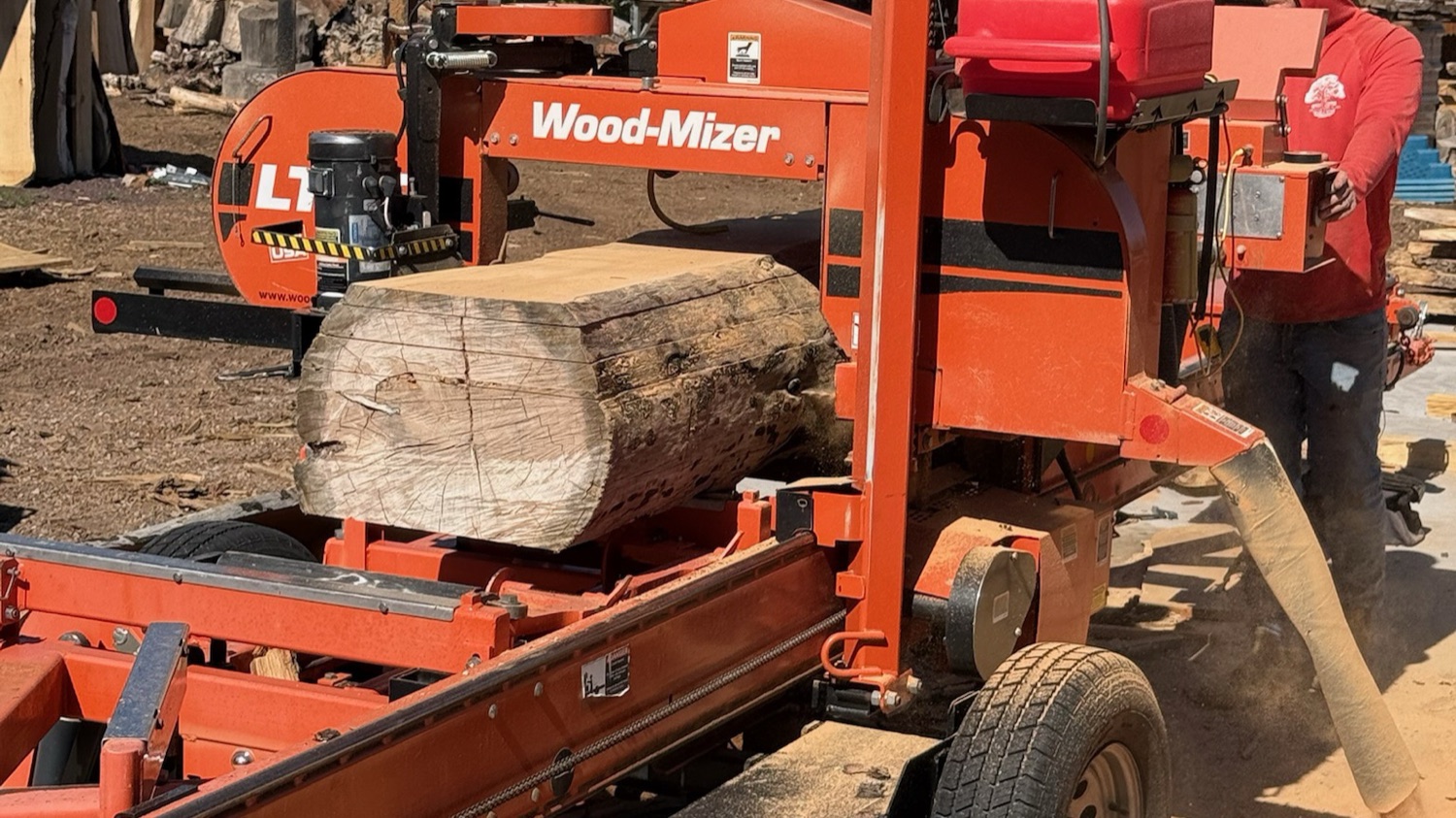 A live-edge slab being cut on the sawmill in Northern Arizona